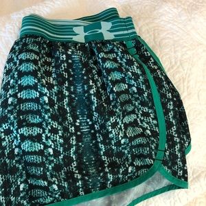 Girls Under Amour shorts.